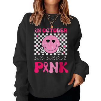 Groovy Breast Cancer Awareness In October We Wear Pink Women Sweatshirt - Seseable