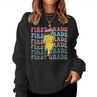 Groovy First Grade Lightning Pencil Retro Teacher Women Sweatshirt - Monsterry CA