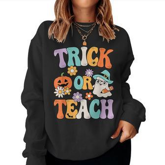 Groovy Halloween Trick Or Teach Retro Pumpkin Ghost Teacher Women Sweatshirt - Monsterry CA