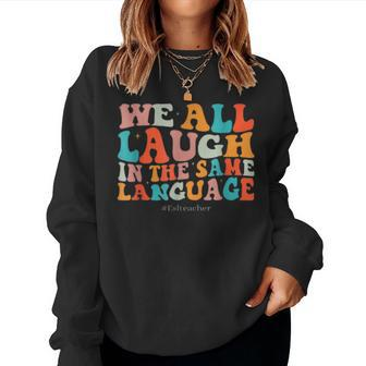 Groovy We All Laugh In The Same Language Esl Teachers Women Sweatshirt - Monsterry