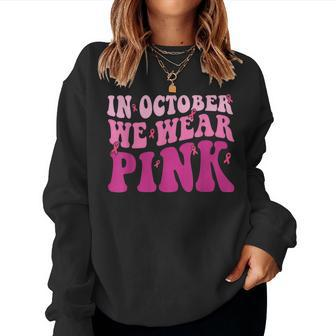 Groovy In October We Wear Pink Breast Cancer For Women Sweatshirt - Seseable