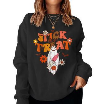 Groovy Stick Or Treat Er Tech Fall Autumn Nurse Halloween Women Sweatshirt - Seseable