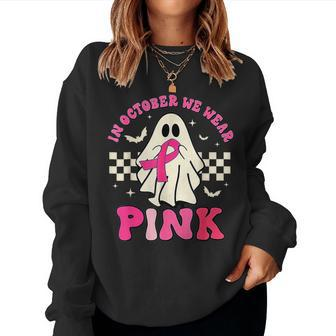 Groovy We Wear Pink Breast Cancer Awareness Ghost Halloween Women Sweatshirt - Seseable