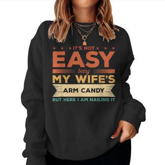 Its Not Easy Being My Wifes Arm Candy But Here I Am Women Crewneck Graphic Sweatshirt - Seseable