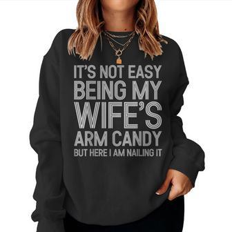 Its Not Easy Being My Wifes Arm Candy Here I Am Nailing It Women Crewneck Graphic Sweatshirt - Seseable