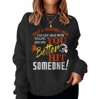 Only A Mom Telling Her Son You Better Hit Someone Football Women Sweatshirt | Mazezy
