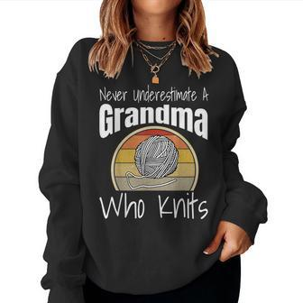 Never Underestimate A Grandma Who Knits Knitting Retro Funny Women Crewneck Graphic Sweatshirt - Seseable