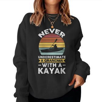 Never Underestimate A Grandma With A Kayak Kayak Gift For Womens Women Crewneck Graphic Sweatshirt - Seseable