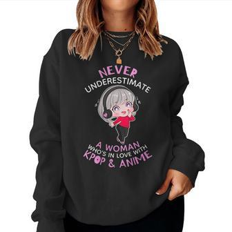 Never Underestimate A Woman In Love With Kpop And Anime Gift For Womens Women Crewneck Graphic Sweatshirt - Seseable
