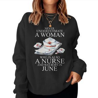 Never Underestimate A Woman Who Is A Nurse Born In June Women Crewneck Graphic Sweatshirt - Seseable