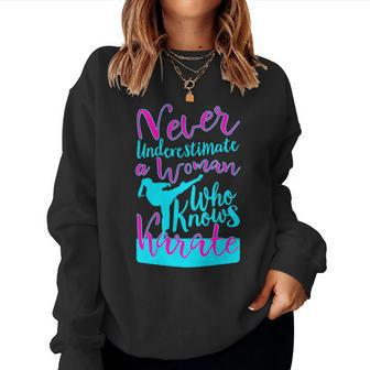 Never Underestimate A Woman Who Knows Karate Gift For Mom Women Crewneck Graphic Sweatshirt - Seseable