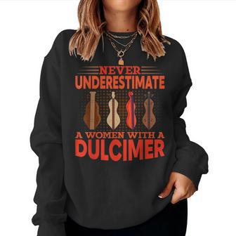Never Underestimate A Women With A Dulcimer Guitar Women Crewneck Graphic Sweatshirt - Seseable
