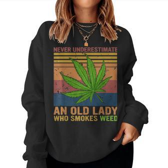 Never Underestimate An Old Lady Who Smokes Weed Cannabis Women Crewneck Graphic Sweatshirt - Seseable