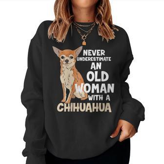 Never Underestimate An Old Woman With A Chihuahua Dog Lover Gift For Womens Women Crewneck Graphic Sweatshirt - Seseable