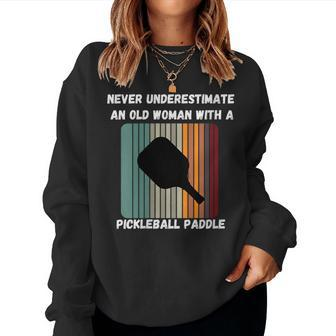 Never Underestimate Old Woman With Pickleball Paddle Retro Gift For Womens Women Crewneck Graphic Sweatshirt - Seseable