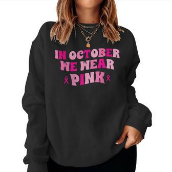 In October We Wear Pink Breast Cancer Awareness Retro Groovy Women Sweatshirt - Monsterry AU