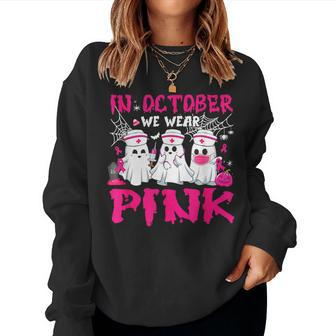 In October We Wear Pink Nurse Ghost Halloween Breast Cancer Women Sweatshirt - Monsterry CA