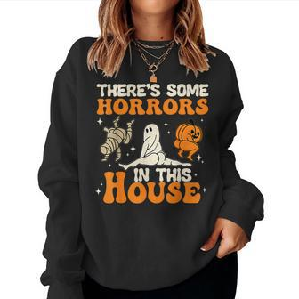 There's Some Horrors In This House Halloween Women Sweatshirt | Mazezy