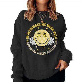 In September We Wear Gold Childhood Cancer Awareness Groovy Women Sweatshirt | Mazezy