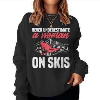 Ski Funny Skiing Never Underestimate A Woman On Skis Gift For Womens Women Crewneck Graphic Sweatshirt - Seseable