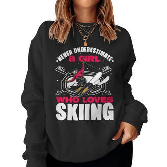 Ski Lovers Never Underestimate A Girl Who Loves Skiing Women Sweatshirt | Mazezy