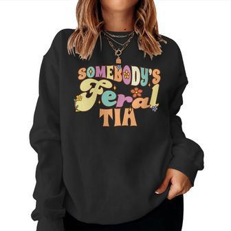 Somebodys Feral Tia Spanish Aunt Family Pun Groovy Auntie Women Sweatshirt | Mazezy