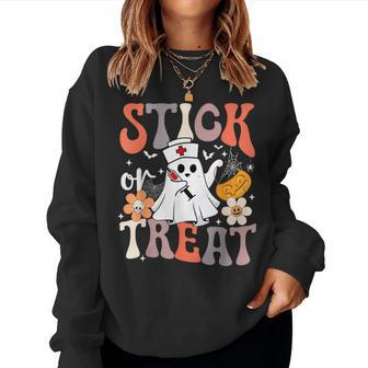 Stick Or Treat Ghost Nurse Halloween Crna Emergency Er Nurse Women Sweatshirt | Mazezy