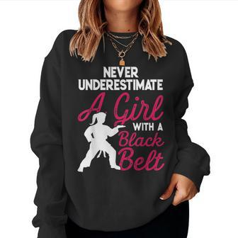 Strong Women Never Underestimate A Girl With A Black Belt Women Crewneck Graphic Sweatshirt - Seseable