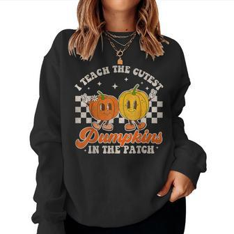 I Teach The Cutest Pumpkins In The Patch Retro Teacher Fall Women Sweatshirt | Mazezy