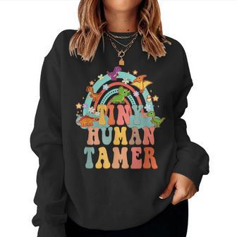 Tiny Human Tamer Groovy Rainbow Daycare Provider Teacher Women Sweatshirt | Mazezy