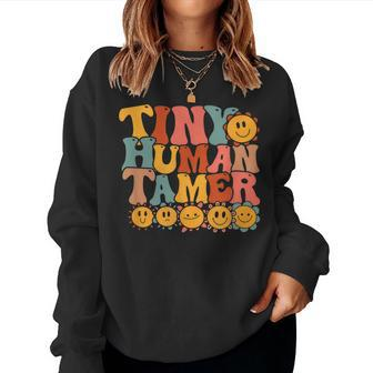 Tiny Human Tamer Retro Groovy Preschool Kindergarten Teacher Women Crewneck Graphic Sweatshirt - Thegiftio UK