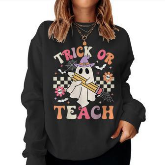 Trick Or Teach Groovy Teacher Halloween Retro Floral Ghost Women Sweatshirt - Seseable