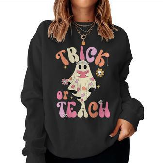 Trick Or Teach Retro Floral Groovy Ghost Teacher Halloween Women Sweatshirt - Thegiftio UK