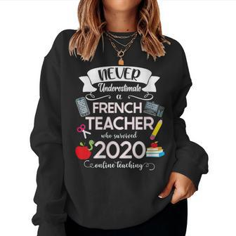 Never Underestimate A French Teacher Who Survived 2020 Women Sweatshirt | Mazezy
