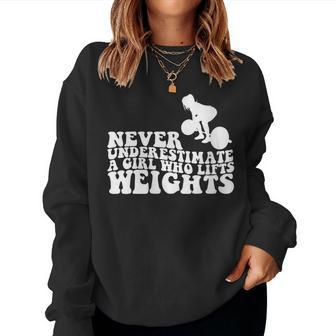 Never Underestimate A Girl Who Lifts Weights Weightlifter Women Sweatshirt - Seseable