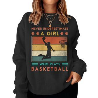 Never Underestimate A Girl Who Plays Basketball Girls Women Sweatshirt | Mazezy