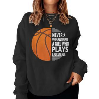 Never Underestimate A Girl Who Plays Basketball Basketball Women Sweatshirt | Mazezy