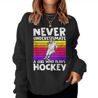 Never Underestimate A Girl Who Plays Hockey Girl Hockey Women Sweatshirt - Seseable