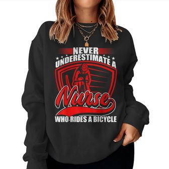 Never Underestimate A Nurse Who Rides A Bicycle Women Sweatshirt - Monsterry AU