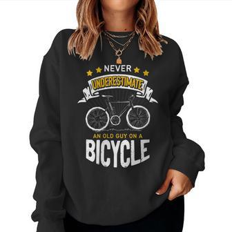 Never Underestimate An Old Guy On Bicycle Bike Cycling Retro Women Sweatshirt - Seseable