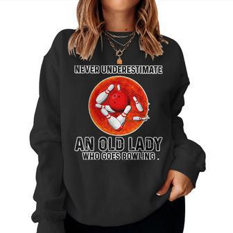 Never Underestimate An Old Lady Who Goes Bowling Women Sweatshirt | Mazezy