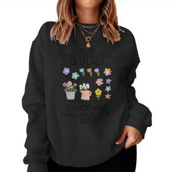 Never Underestimate An Old Lady Who Loves Gardening Born May Women Sweatshirt | Mazezy
