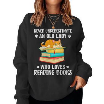 Never Underestimate An Old Lady Who Loves Reading Books Cat Women Sweatshirt - Monsterry CA