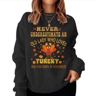 Never Underestimate An Old Lady Who Loves Turkey November Women Sweatshirt - Thegiftio UK