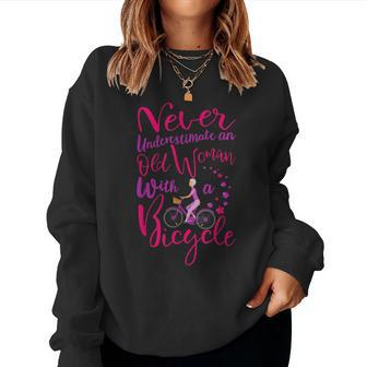 Never Underestimate An Old Woman With A Bicycle Quote Women Sweatshirt - Thegiftio UK