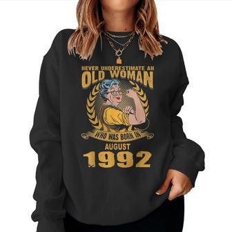 Never Underestimate Old Woman Born In August 1992 Women Sweatshirt | Mazezy
