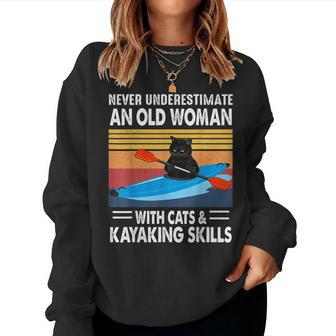 Never Underestimate An Old Woman With Cats And Kayaking Women Sweatshirt - Monsterry UK