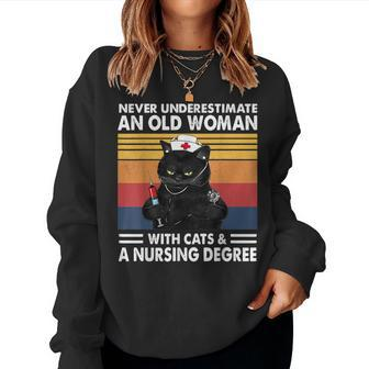 Never Underestimate An Old Woman With Cats And Nursing Women Sweatshirt | Mazezy