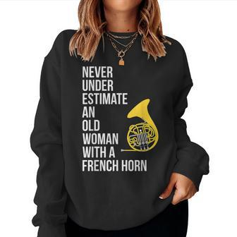 Never Underestimate An Old Woman With A French Horn Women Sweatshirt - Seseable