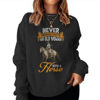 Never Underestimate An Old Woman With A Horse Riding Horses Women Sweatshirt | Mazezy CA